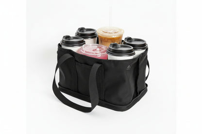 A black reusable coffee tote bag with six handles, shown holding six drinks in travel cups on a clean white background.